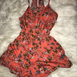 Bright orange/tangerine flower covered Romper